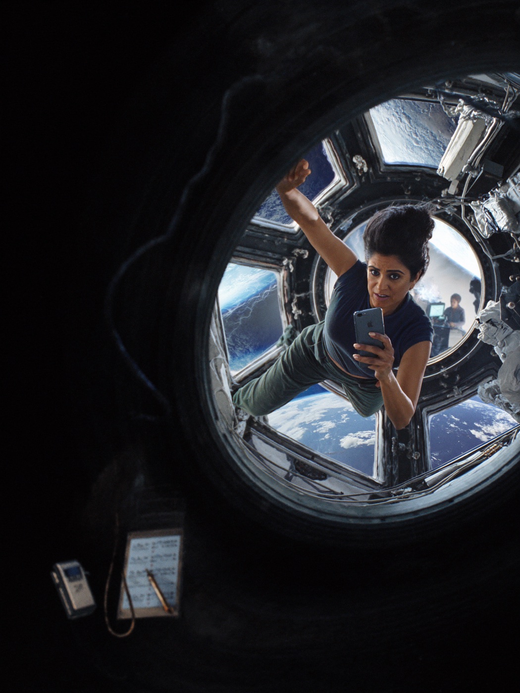An astronaut using Arcs on an iPhone aboard the International Space Station